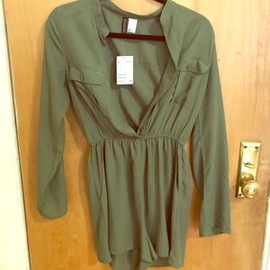 Offers welcome! Green Romper - new with tags