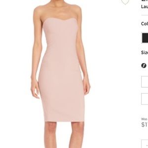 Peach/pink strapless figure-hugging dress, new.