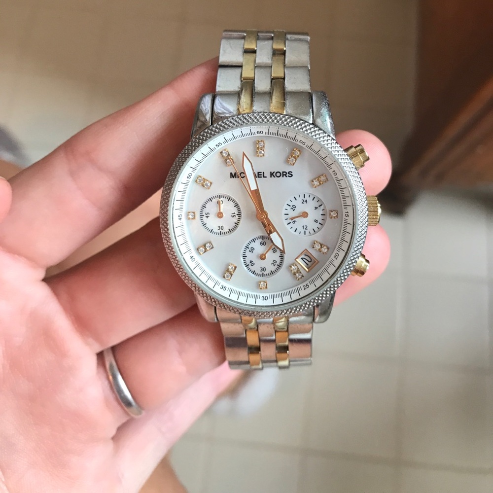 Micheal Kors gold and silver watch two toned