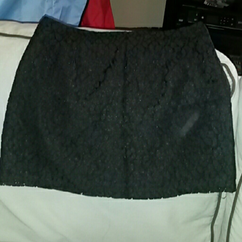 Black lace with slight.shimmer mini skirt