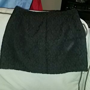 Black lace with slight.shimmer mini skirt