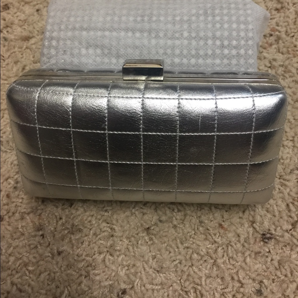 Brand new silver clutch