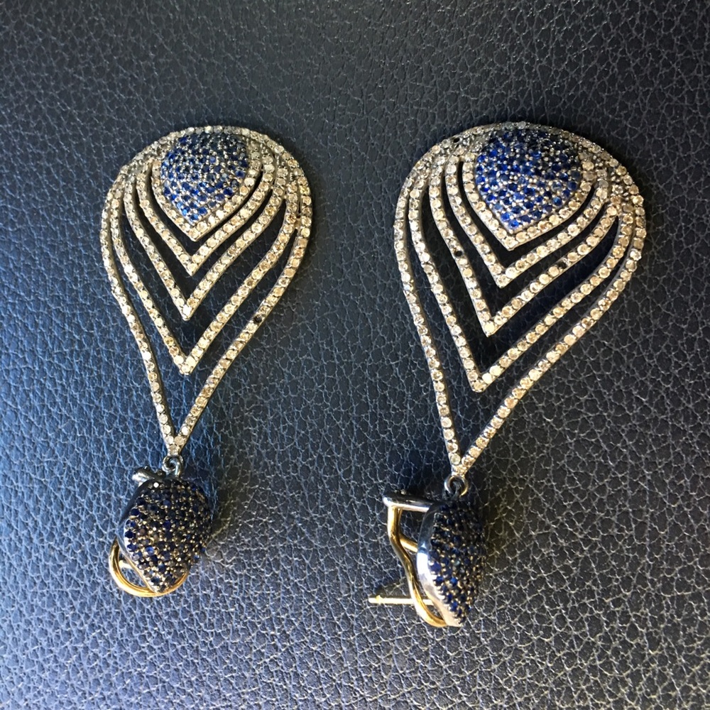 hanging earrings in blue sapphire and diamonds