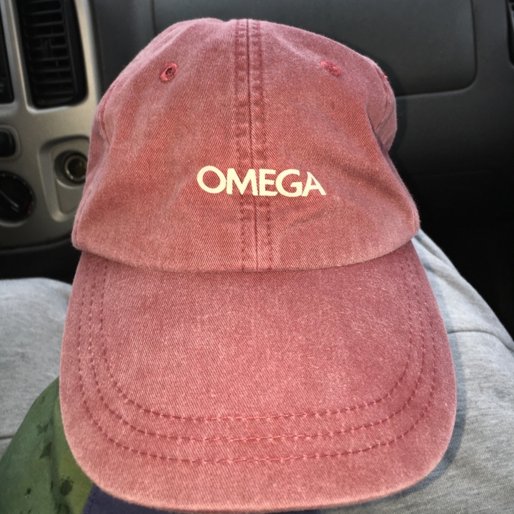 Vintage worn maroon Omega hat
