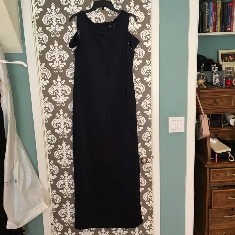 Long navy blue sleeveless dress.