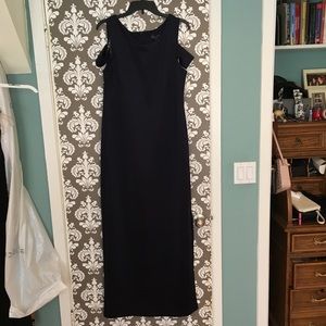 Long navy blue sleeveless dress.