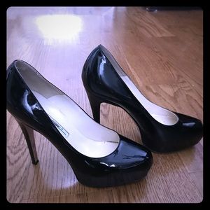 Brian Atwood black patent pumps