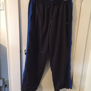 Men’s large Reebok track pants. Black w blue strip