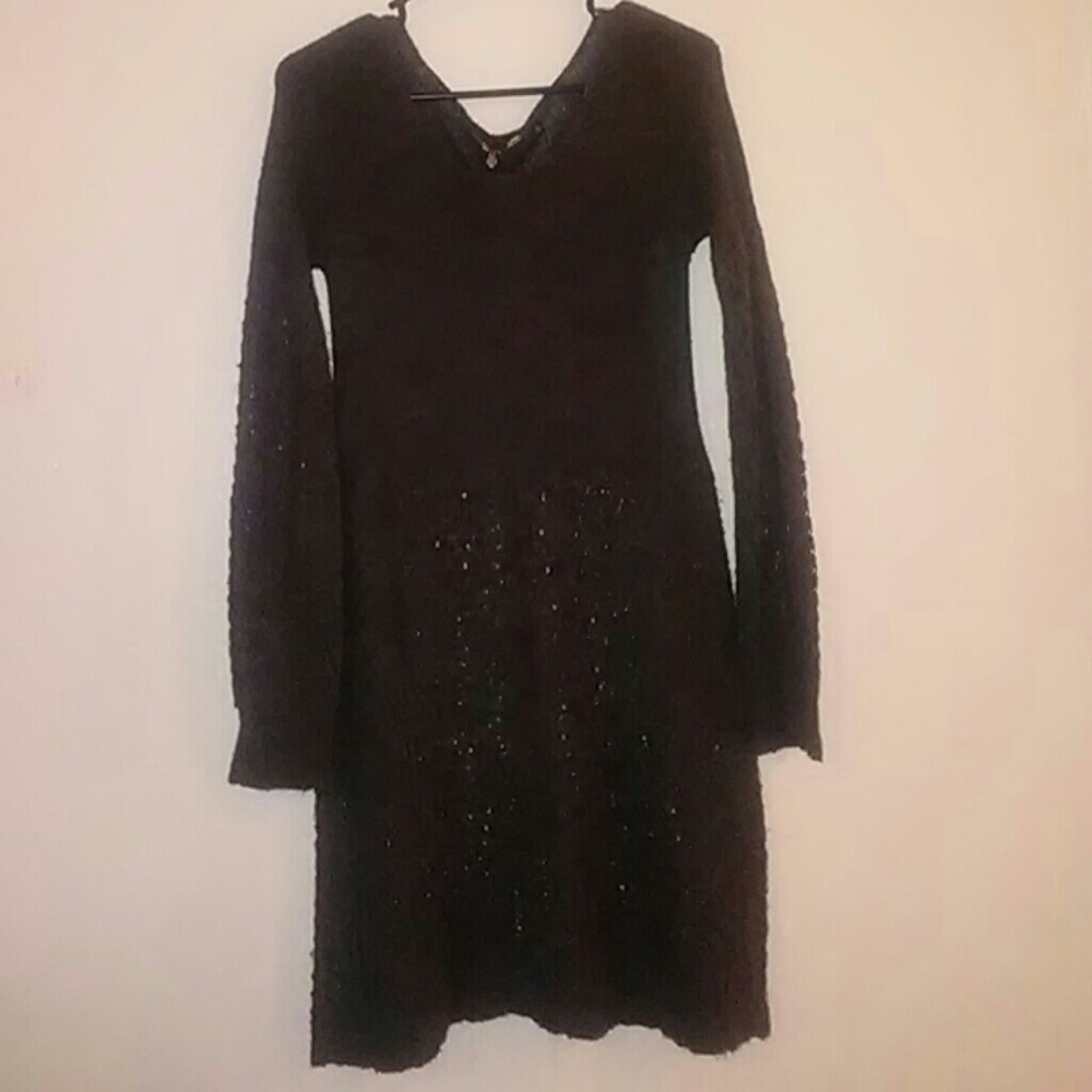 Knitted and knotted sweater dress