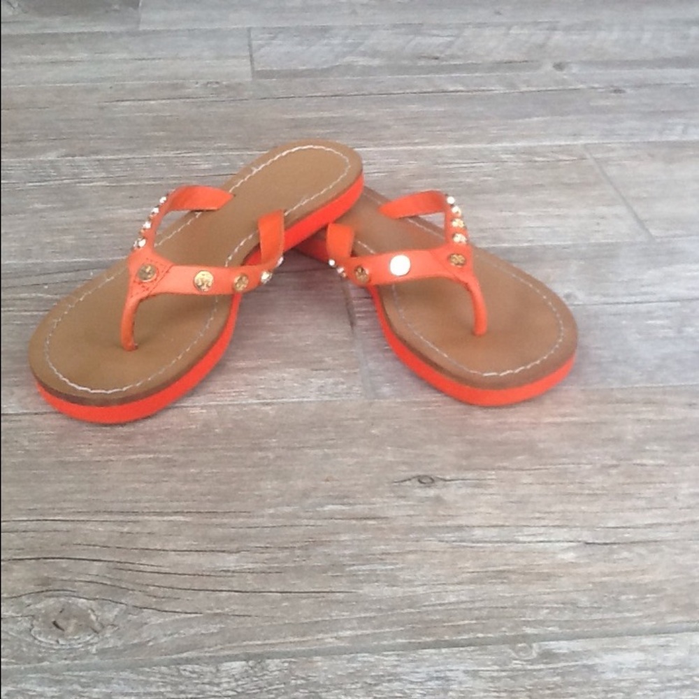 Monogram studded Tory Burch flip flops