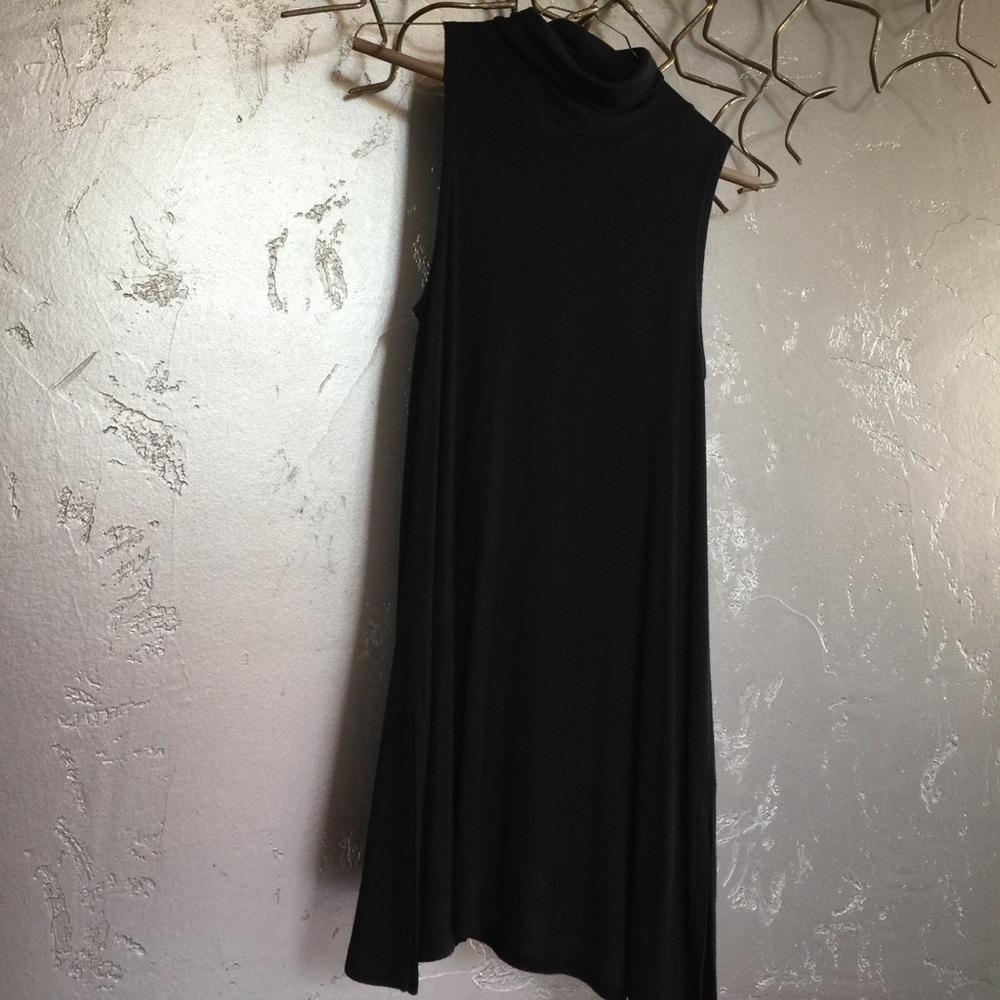 Black Anthropologie long sleeveless top.