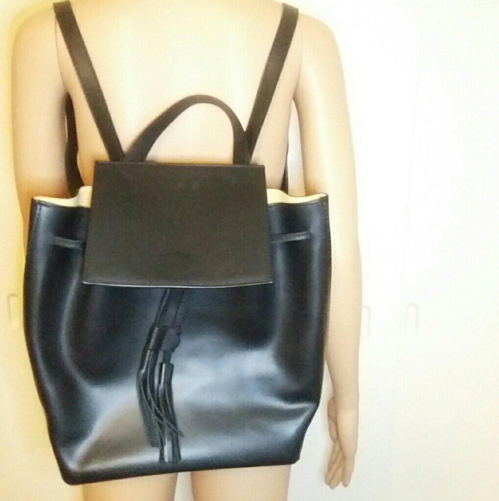 L CREDI leather Backpack with tassle closure