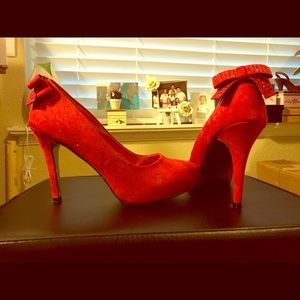 Available in red and black