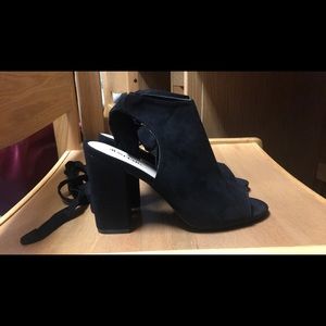 Lace up black booties