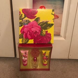Never opened Betsey Johnson 3 piece perfume set