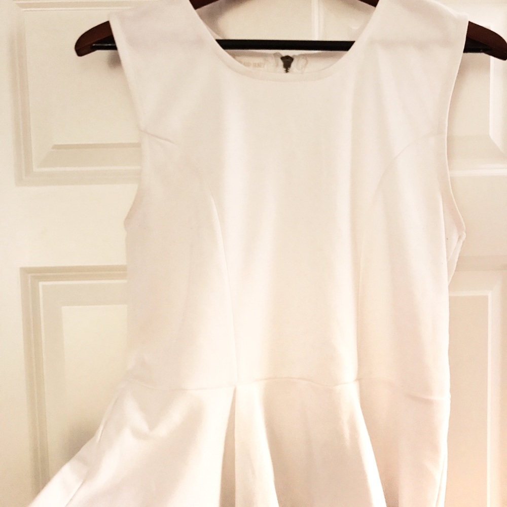 Thyme And Honey White Sleeveless Peplum Top