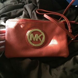 Orange Michael Kors cross body bag