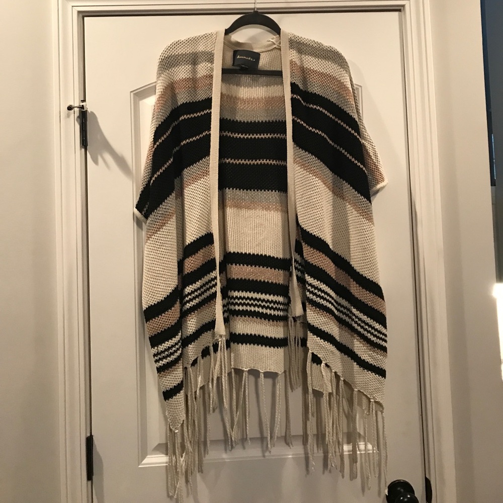 Sweater poncho.