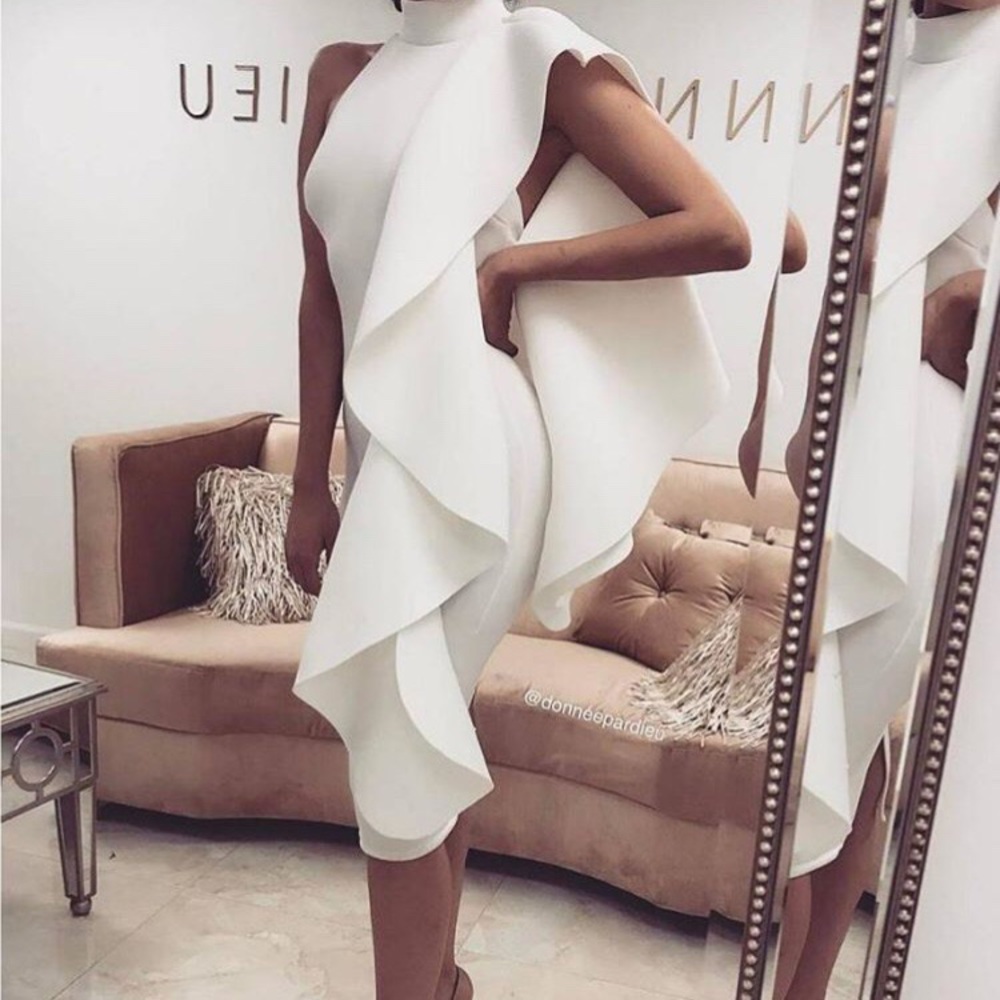 white brand new dress with tags