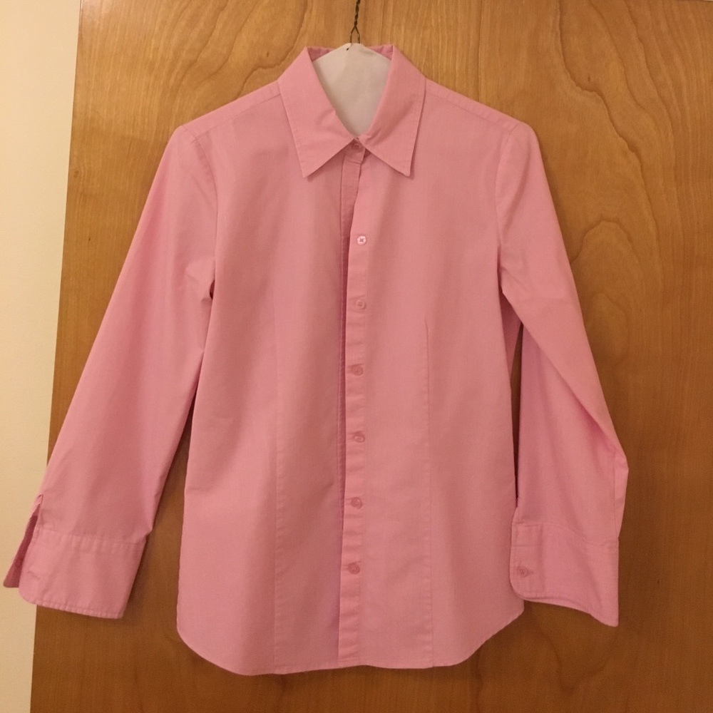Long sleeve button up pink blouse.