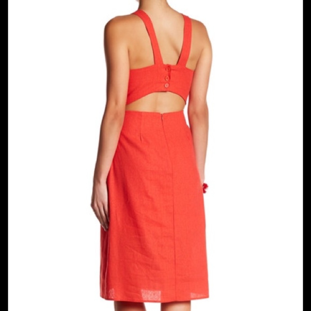 Coral red cutout dress.