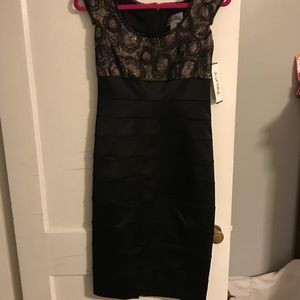 NWT ‼️ beautiful black dress with fun design!