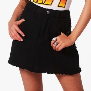 Black denim mini skirt