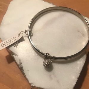 COACH silver plated bangle with charm