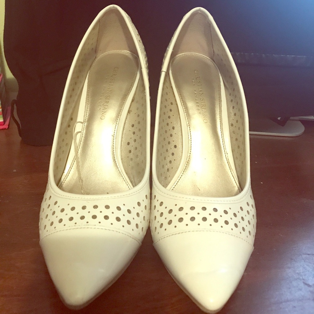 White heels with holes all around  only used once