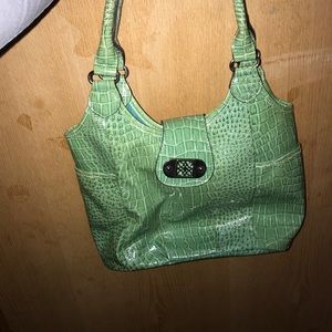 Green bag with in blue interior