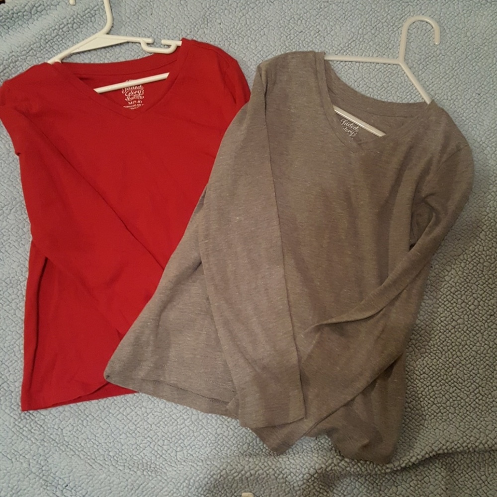 Bundle of 2 girl's  vneck shirts.  Barely worn