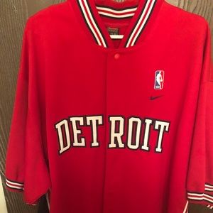 Red Detroit Pistons baseball style jersey.