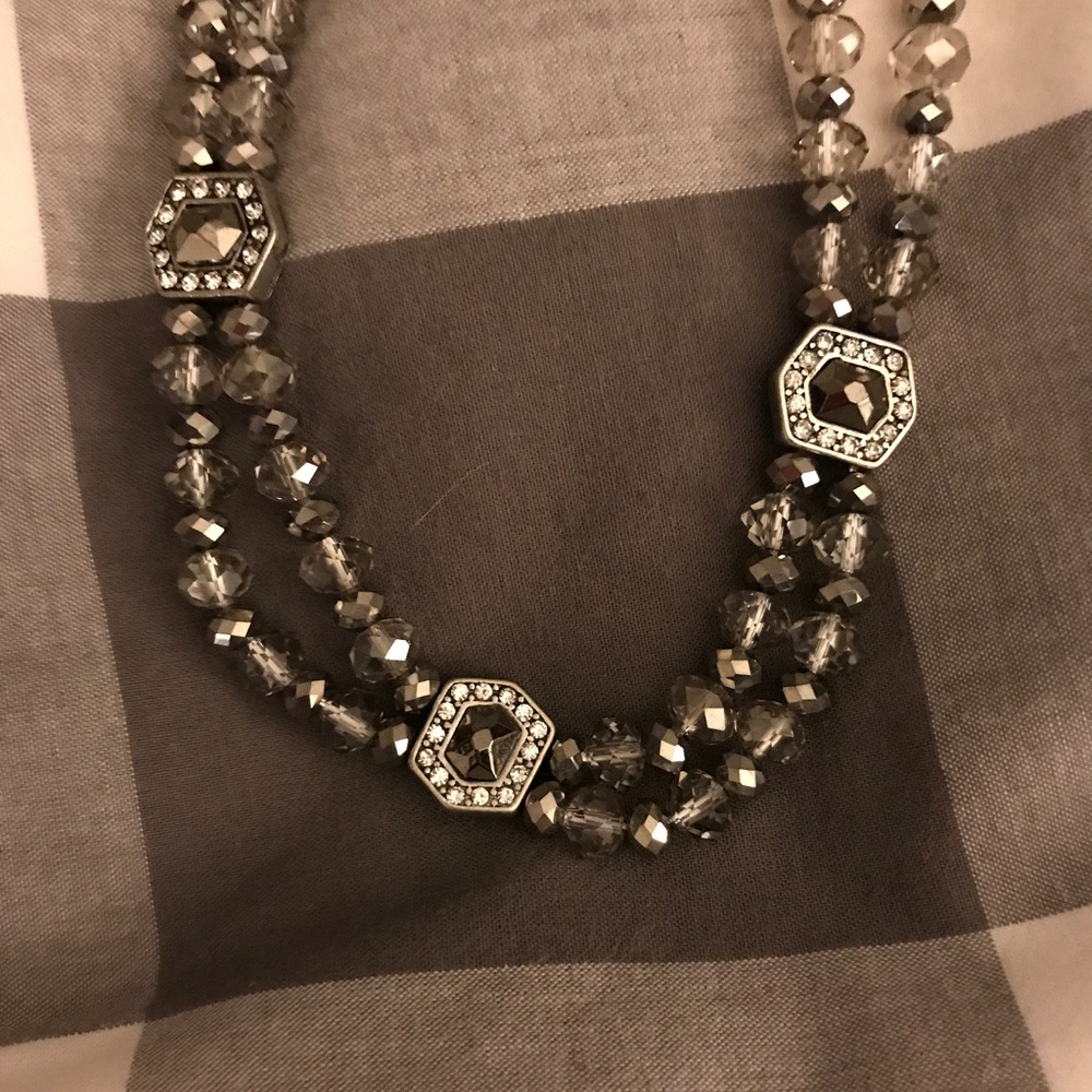 Silver beaded necklace.