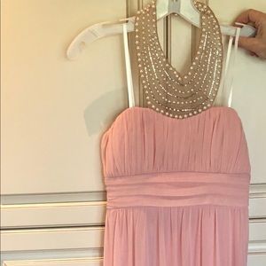 Pearl neck pink halter dress.