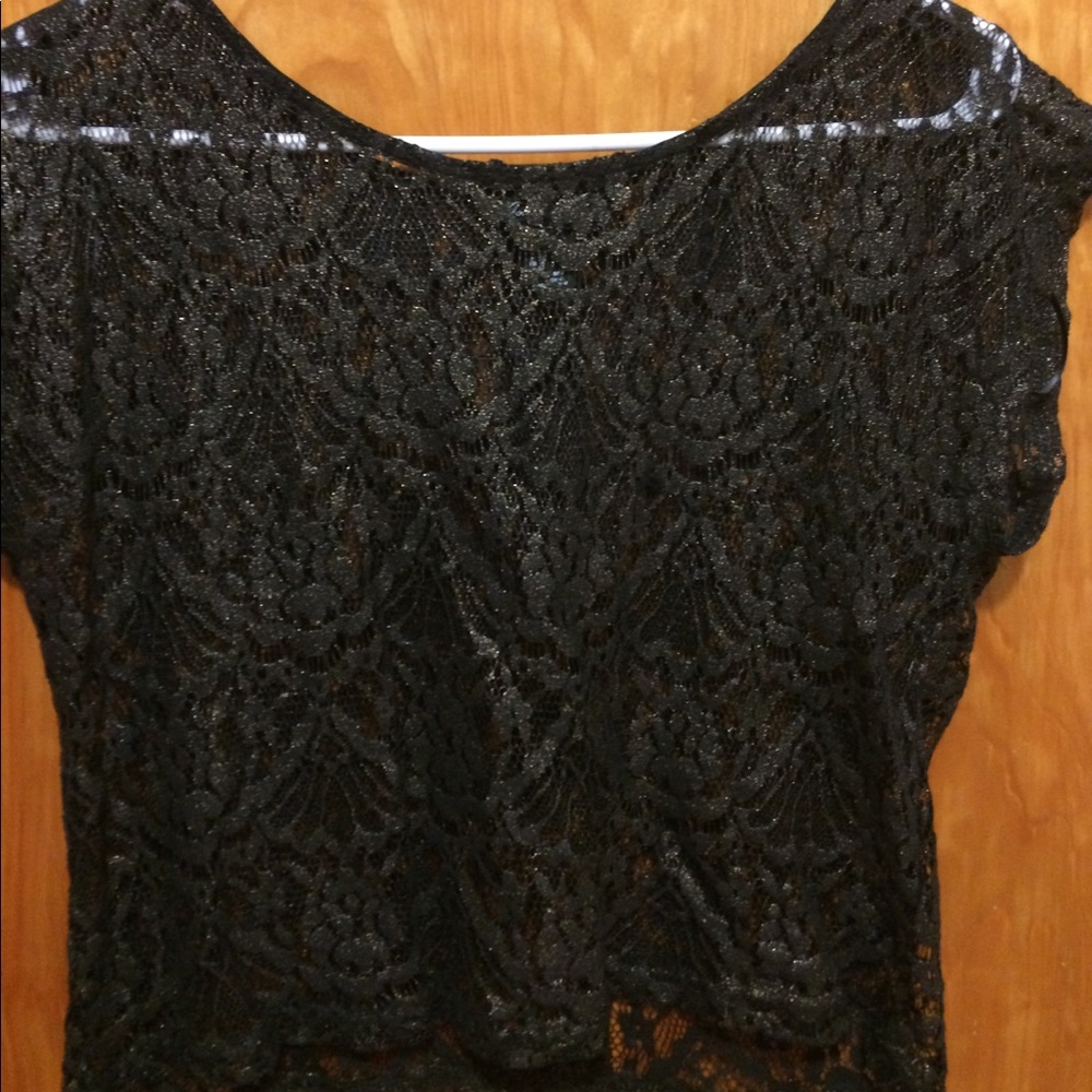 Lace blouse with a bit of shimmer. Back zip