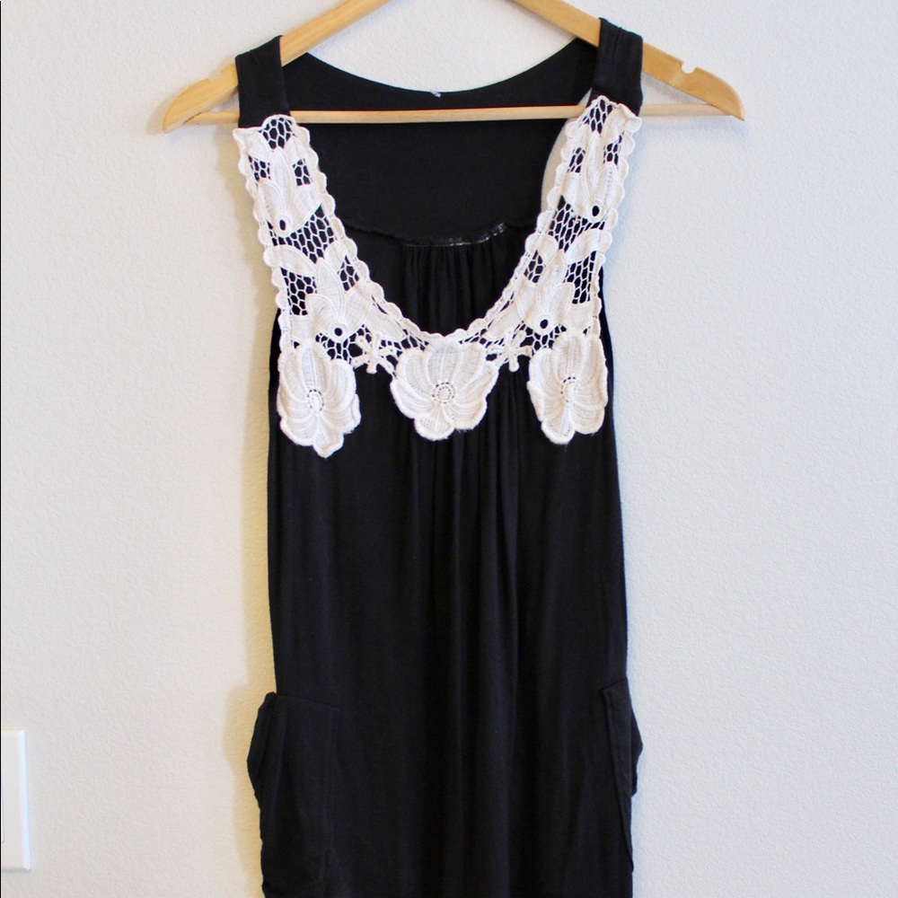 Black tank top with white flowers