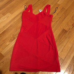 Red body con dress