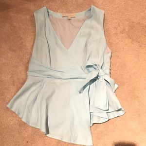 Dance & Marvel light blue sleeveless wrap blouse