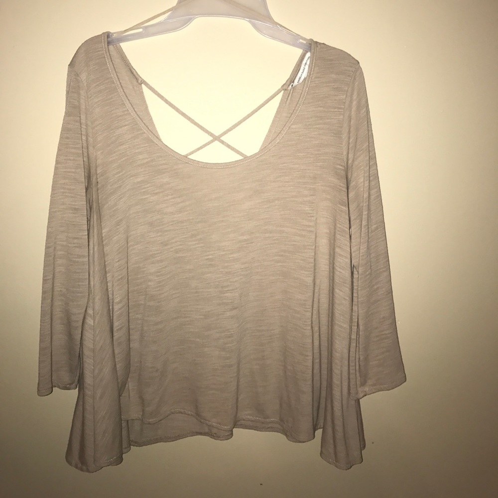 Flowy, open back, cream top