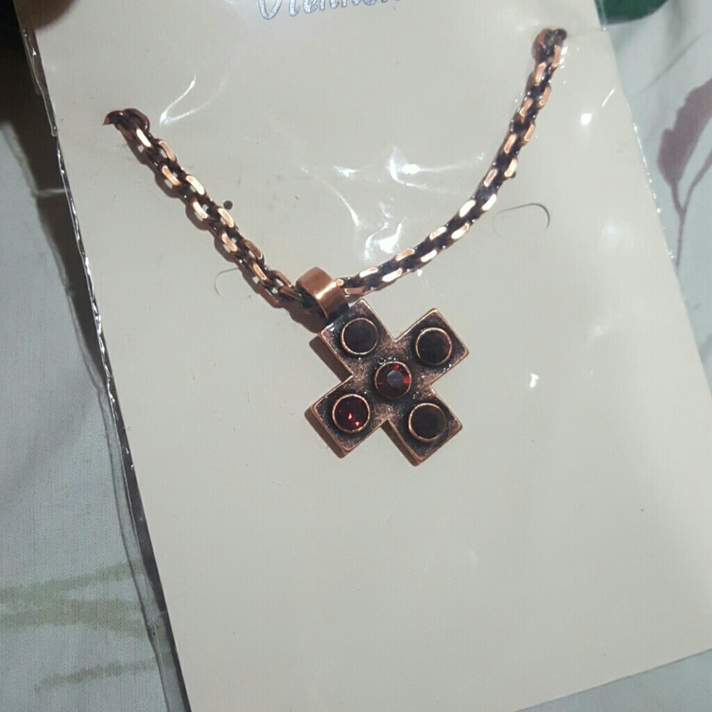 This is a medium size cross pendant chain