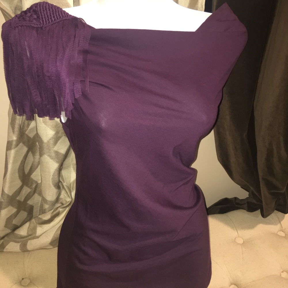 Top with embellished sleeve
