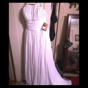 New with tags size 14-16 wedding dress