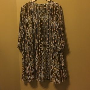 Short and flowing patterned dress.