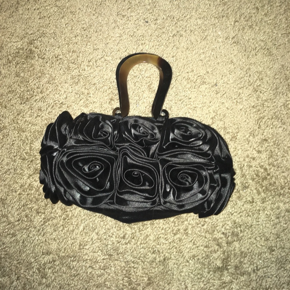 Black ruffley handbag