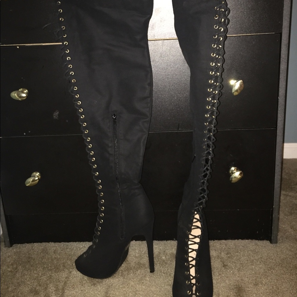Thigh high lace up stiletto boots