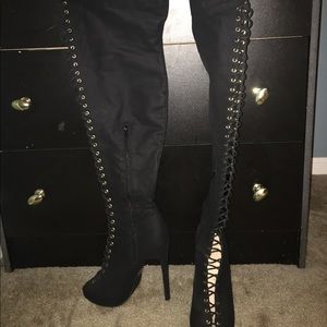 Thigh high lace up stiletto boots