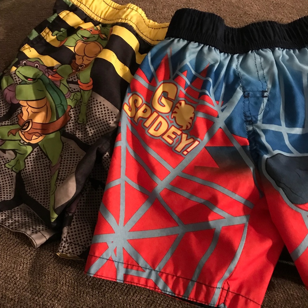 Lot of 2 boys bathing suits. Character