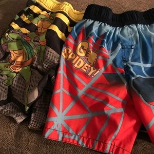 Lot of 2 boys bathing suits. Character