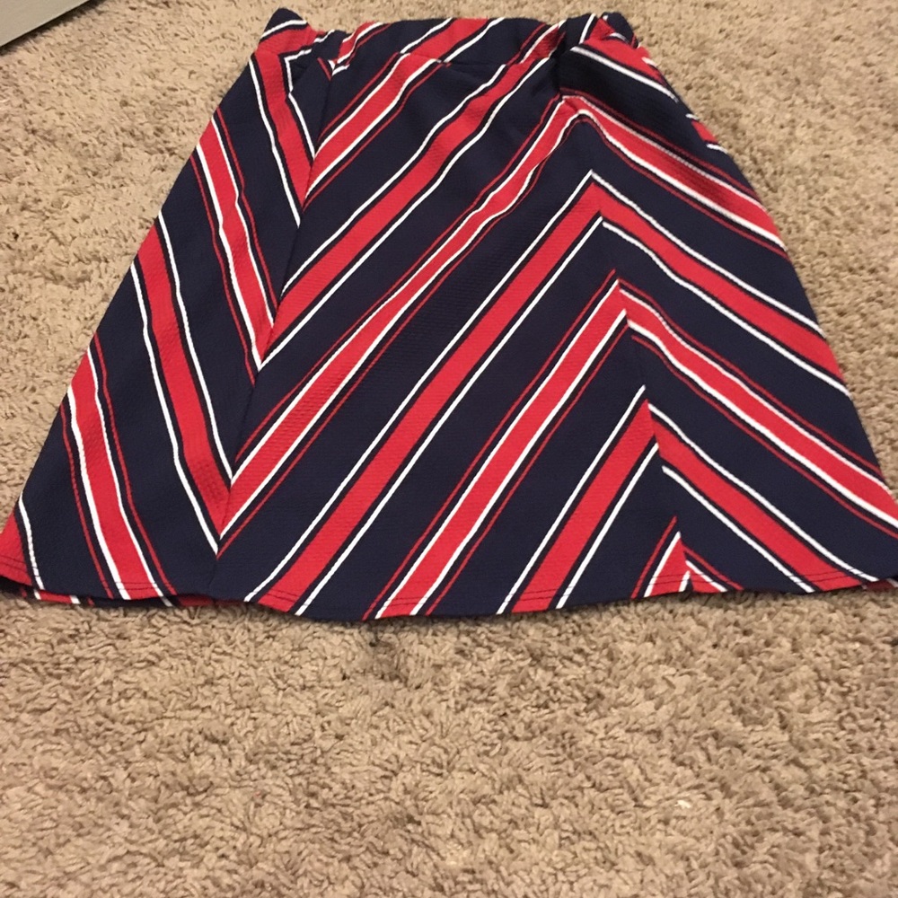Beautiful navy blue, orangish red, and white skirt