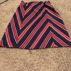 Beautiful navy blue, orangish red, and white skirt